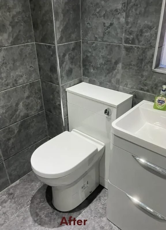 Bathroom after refit, new back-to-wall WC unit and vanity installed